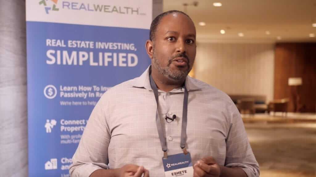 Homepage B Eshete at a RealWealth event