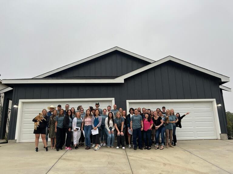 Group photo of people on a tour to San Antonio project Wild Pine San Antonio LLC