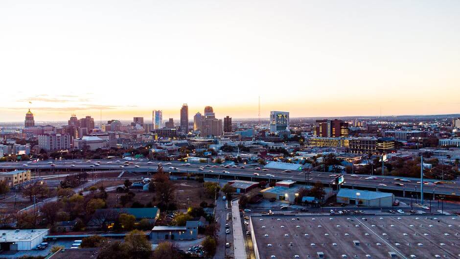 pexels-photo-10886795-10886795 A breathtaking aerial view of San Antonio's skyline during sunset, showcasing its urban charm and high-rise buildings.