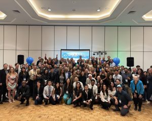 Group photo of RealWealth members at RealWealth Live Event about real estate investing.